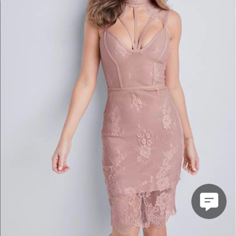 Dusty rose lace dress. New w tags. Never work except tried on